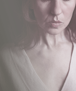 woman serious expression soft lighting portrait