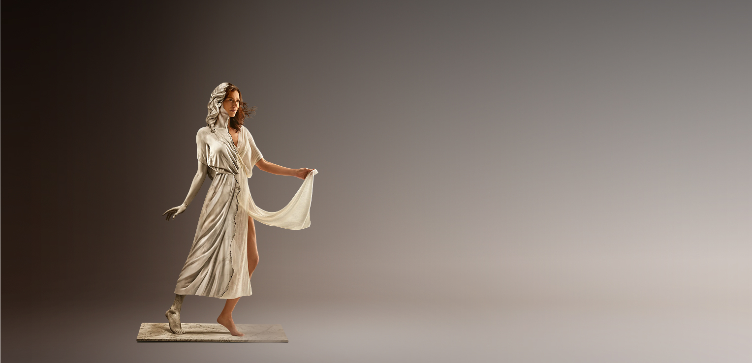 Artistic metaphor of a woman emerging from a marble statue, symbolizing tissue regeneration and the restoration of vitality